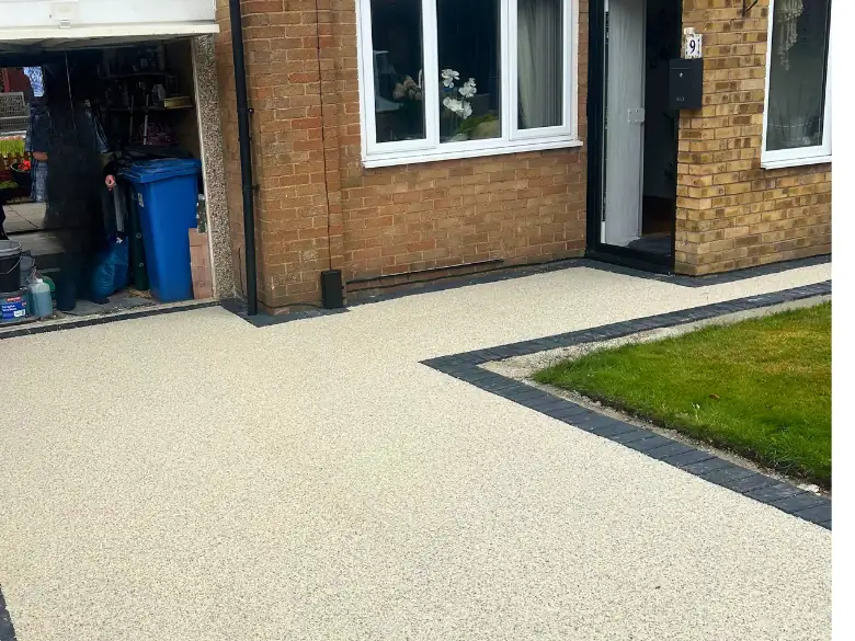 After: Bare lawn to porcelain and turf - S P Groundworks & Driveways