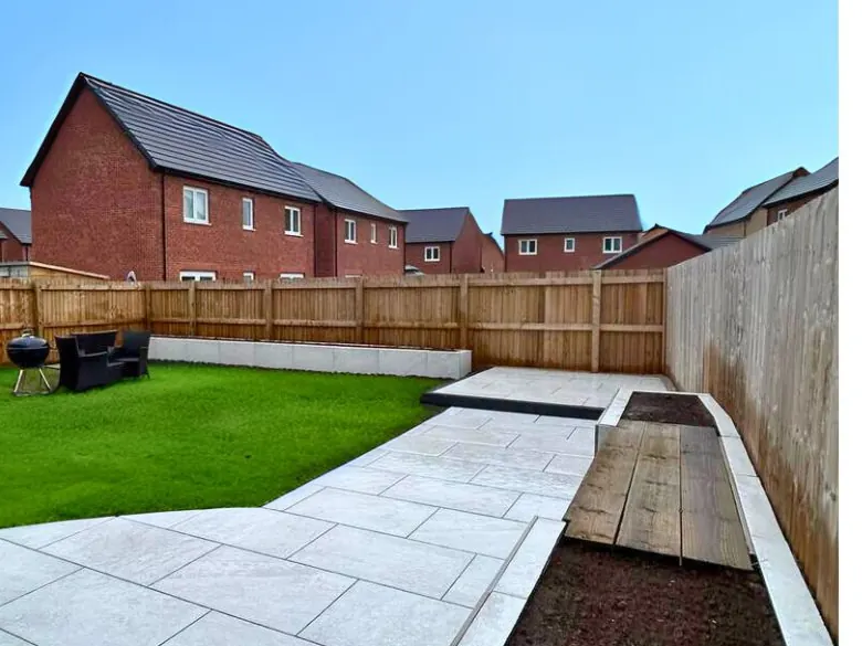 After: New-build lawn to porcelain patio - S P Groundworks & Driveways