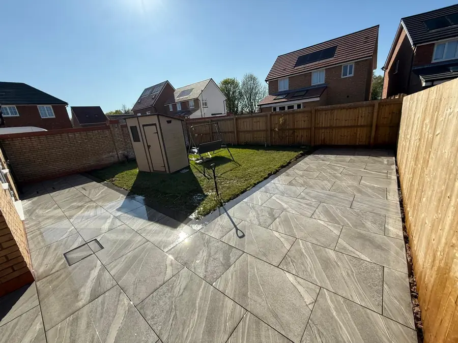 Porcelain by S P Groundworks & Driveways - Modern grey porcelain with lawn and shed base